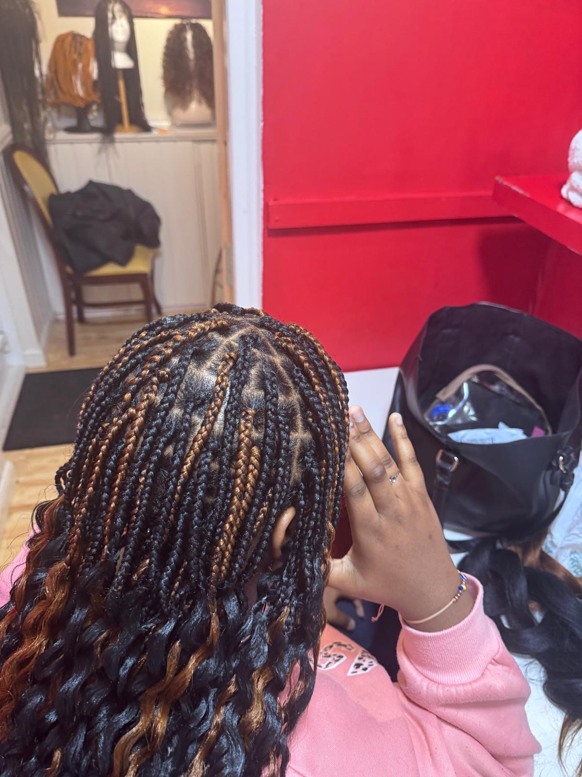 Knotless braids with curly ends