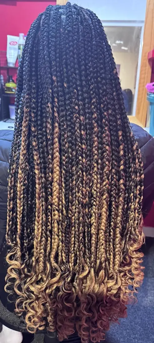 Long box braids with bronze highlights